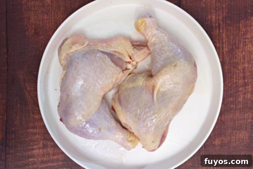 Deliciously Fast Air Fryer BBQ Chicken Leg Quarters 6 rub olive oil into chicken