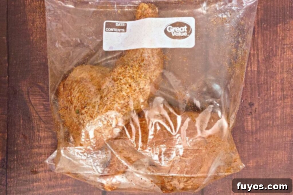 Deliciously Fast Air Fryer BBQ Chicken Leg Quarters 8 mix chicken quarters in bag with seasoning