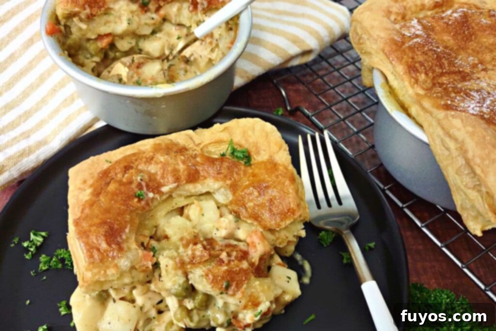 Air Fryer Chicken Pot Pie Forget the Oven 13 chicken pot pie cooked in the air fryer on a plate with a fork