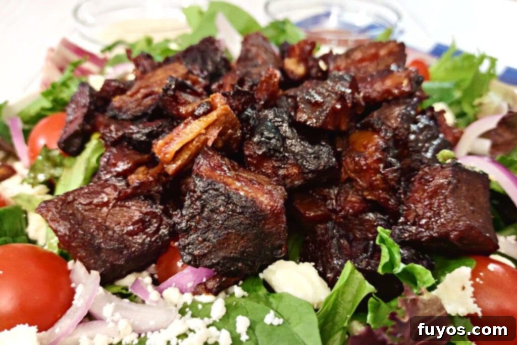 Rapid Air Fryer Burnt Ends: Tender Brisket Bliss 8 closeup of bbq brisket burnt ends salad