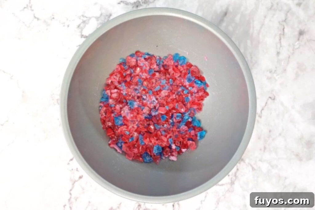 crush jolly ranchers breaking them into tiny pieces