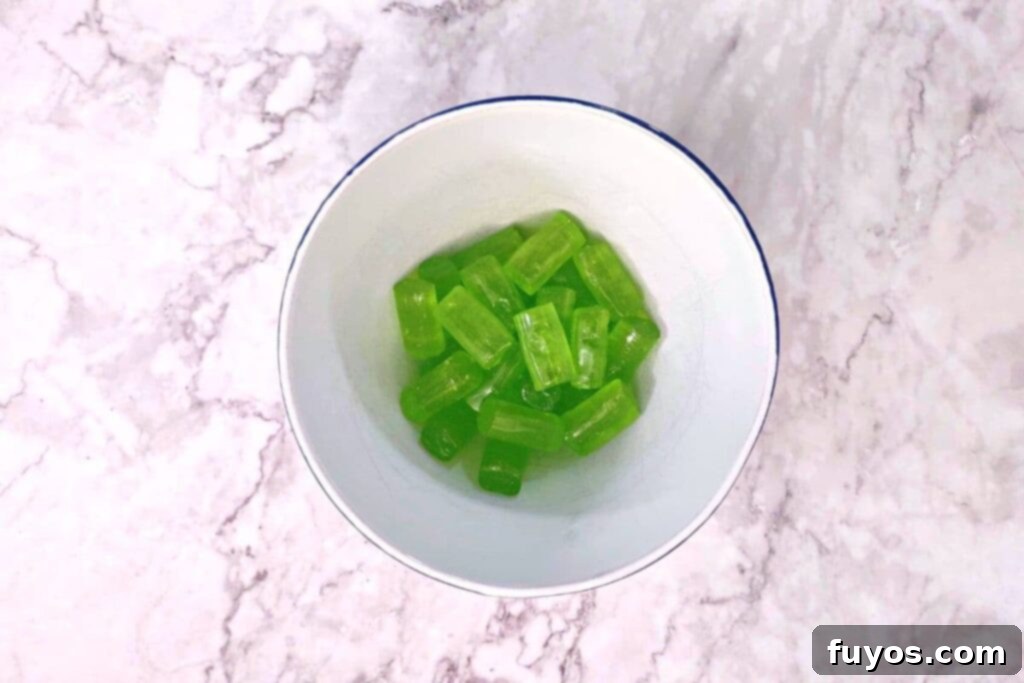 place additional jolly ranchers in a microwave safe bowl