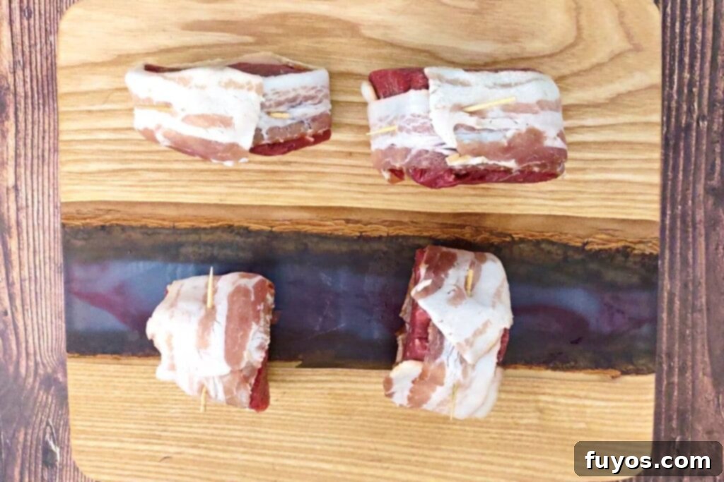 carefully wrap filet with bacon