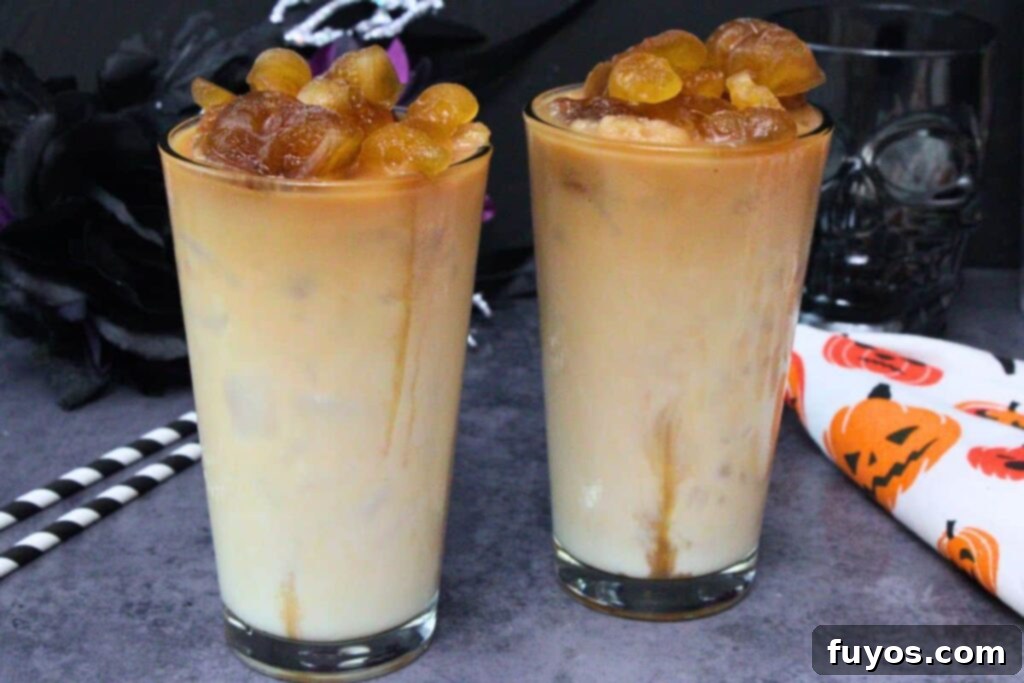 Halloween's Dearly Depar-tead Brown Sugar Skull Milk Tea 10 two skull milk teas side by side topped with brown sugar skull ice