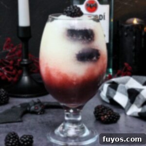 Make Your Own Dracula Juice for Halloween 10 Applebee's Dracula Juice copycat recipe from Dinners Done Quick, featuring the layered frozen drink.