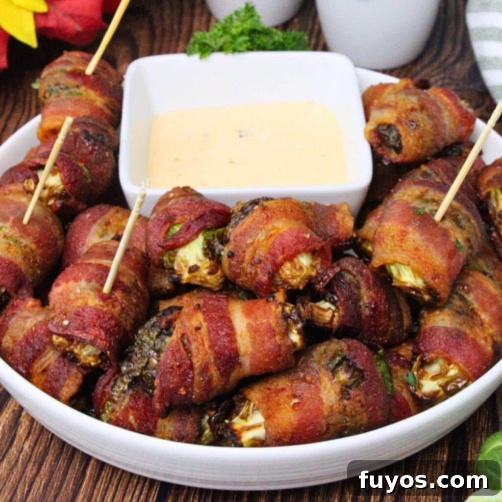 Delicious air fryer bacon wrapped brussel sprouts served as an appetizer