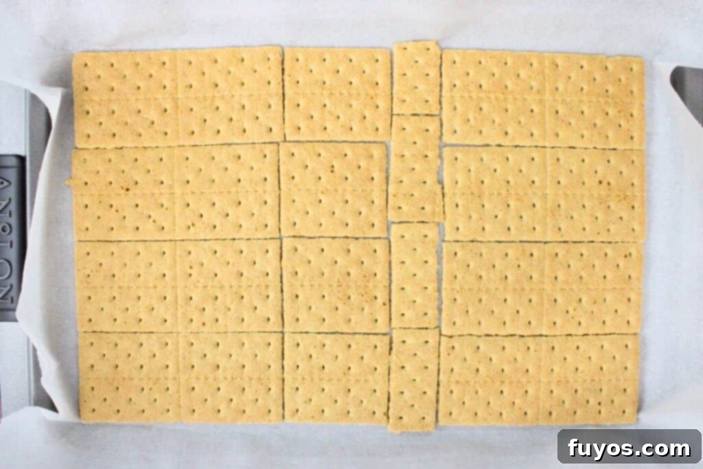 Easy Pecan Pie Toffee Bark 5 add a single layer of graham crackers to cookie sheet