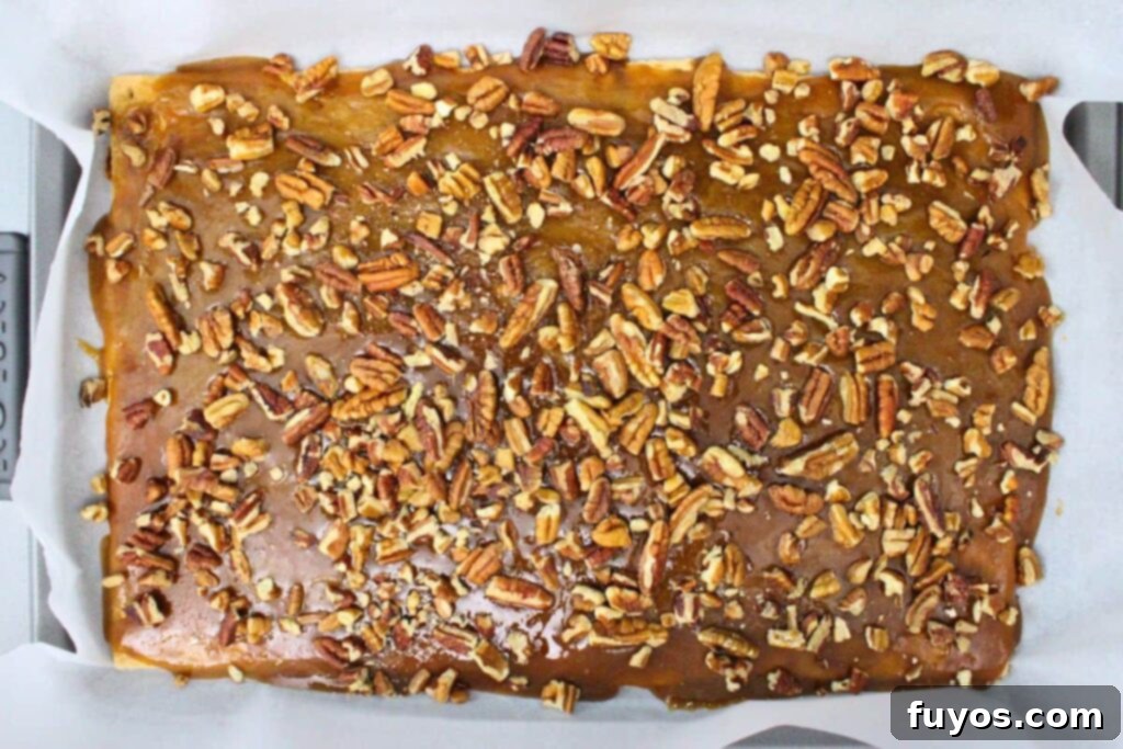 Easy Pecan Pie Toffee Bark 8 sprinkle pecan pieces over hot sugar