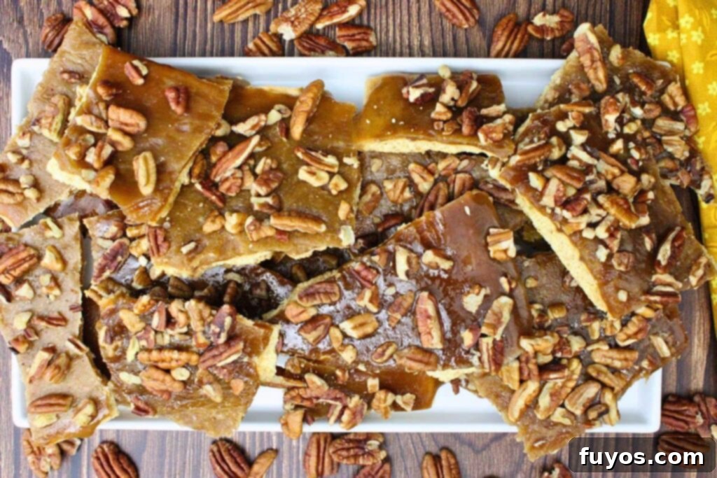 Easy Pecan Pie Toffee Bark 9 overhead view of pecan pie bark pieces on a platter showing lots of pecan and toffee topping
