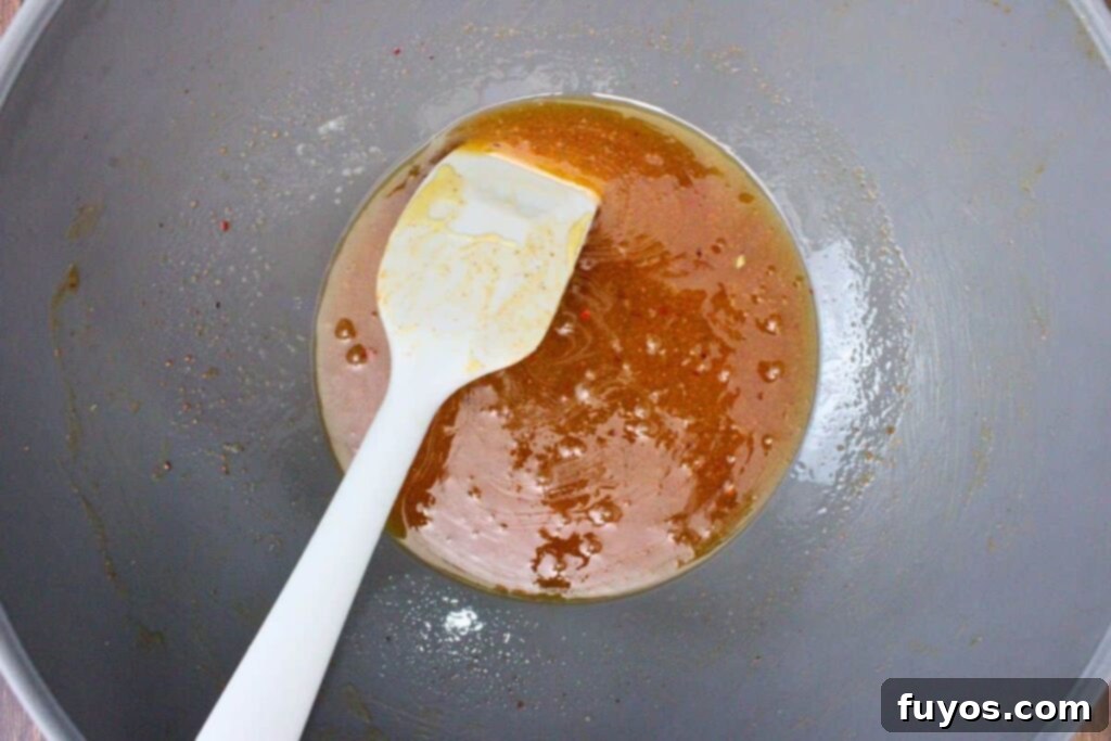 melt remaining butter and add honey, sugar, and remainder of seasoning