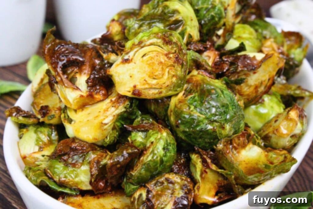 closeup view of copycat longhorn brussel sprouts stacked in a serving bowl