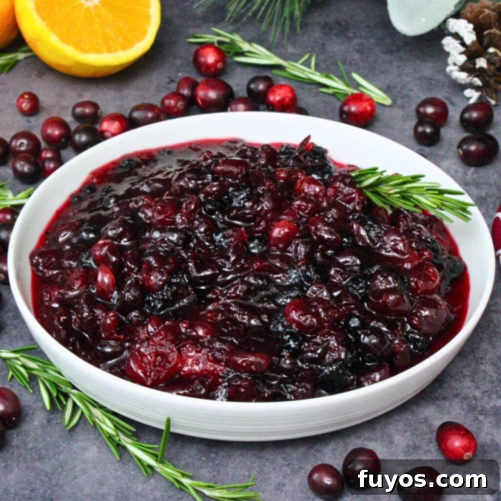 Microwave cranberry sauce recipe, a vibrant red, glossy sauce in a bowl, perfect for holiday dinners, easy to make