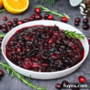 Microwave cranberry sauce recipe, a vibrant red, glossy sauce in a bowl, perfect for holiday dinners, easy to make