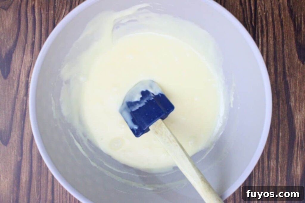 melt white chocolate chips and add vanilla extract to bowl