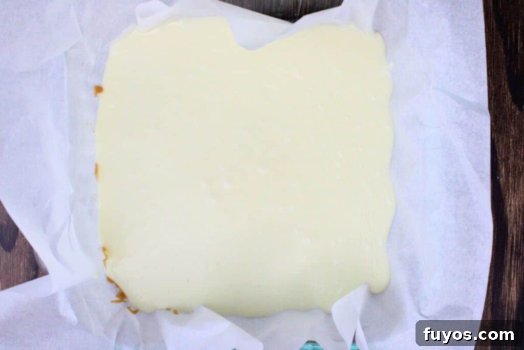 pour vanilla mixture over butterscotch layer