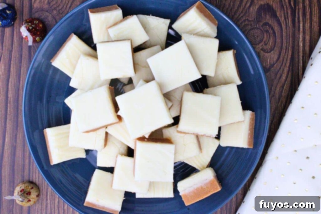 overhead view of butterbeer fudge squares sitting on a blue plate