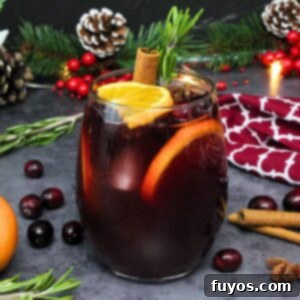 A featured image of the easy cranberry sangria recipe, showcasing its inviting red hue and festive garnishes.