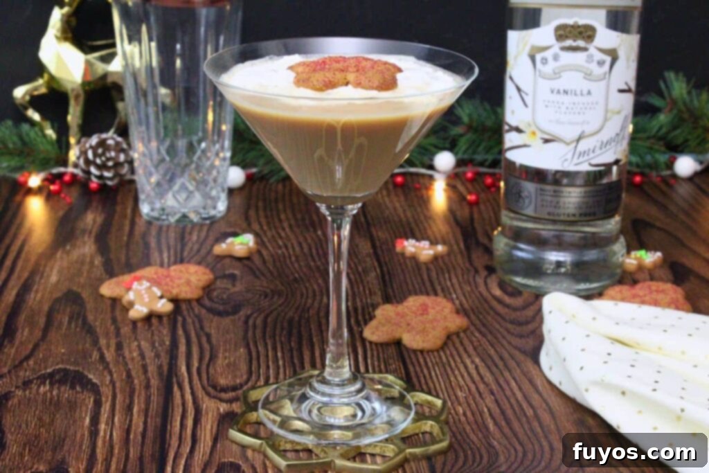 gingerbread martini outback steakhouse copycat drink with whipped cream and cookie in front of vodka bottle