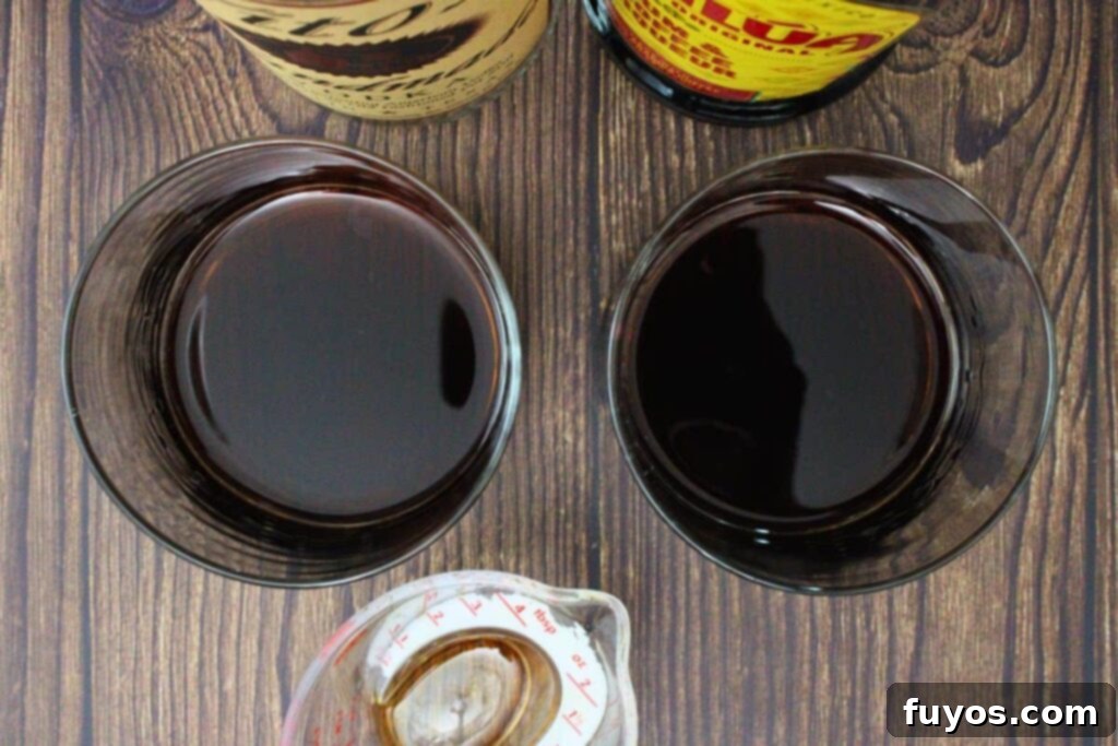 add vodka and coffee liqueur to rocks glass