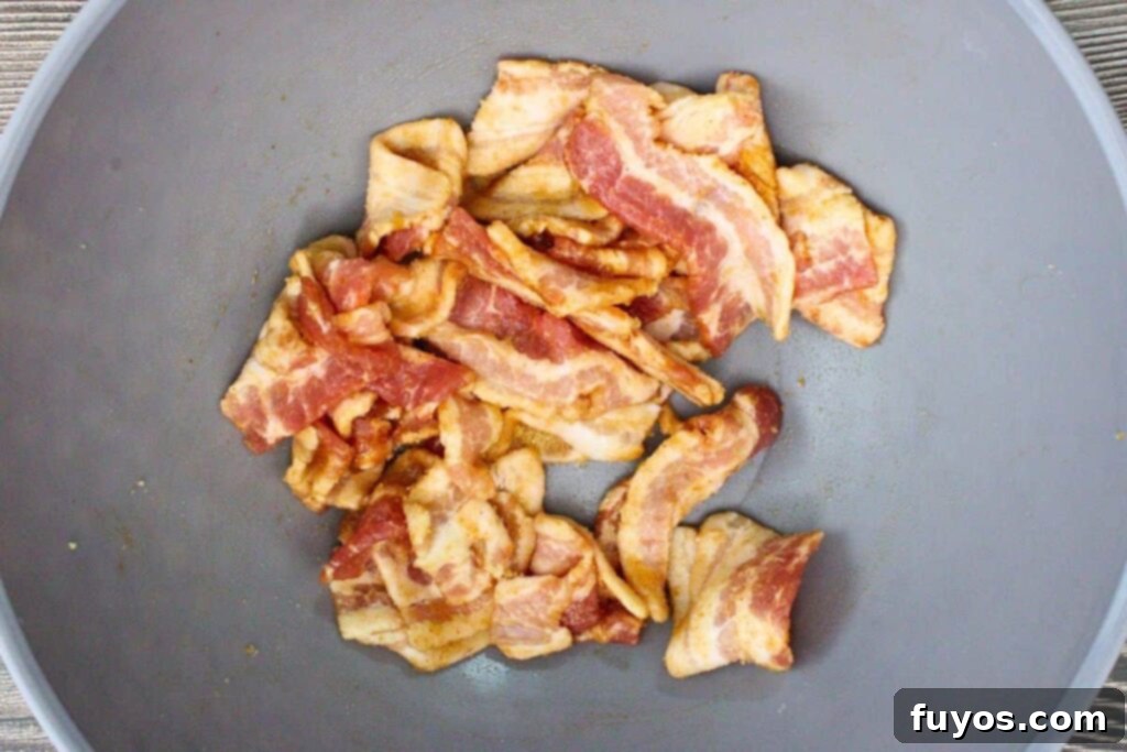 Crispy Air Fryer Bacon Bites: The Perfect Party Snack 5 Toss bacon with brown sugar and sriracha for maximum flavor