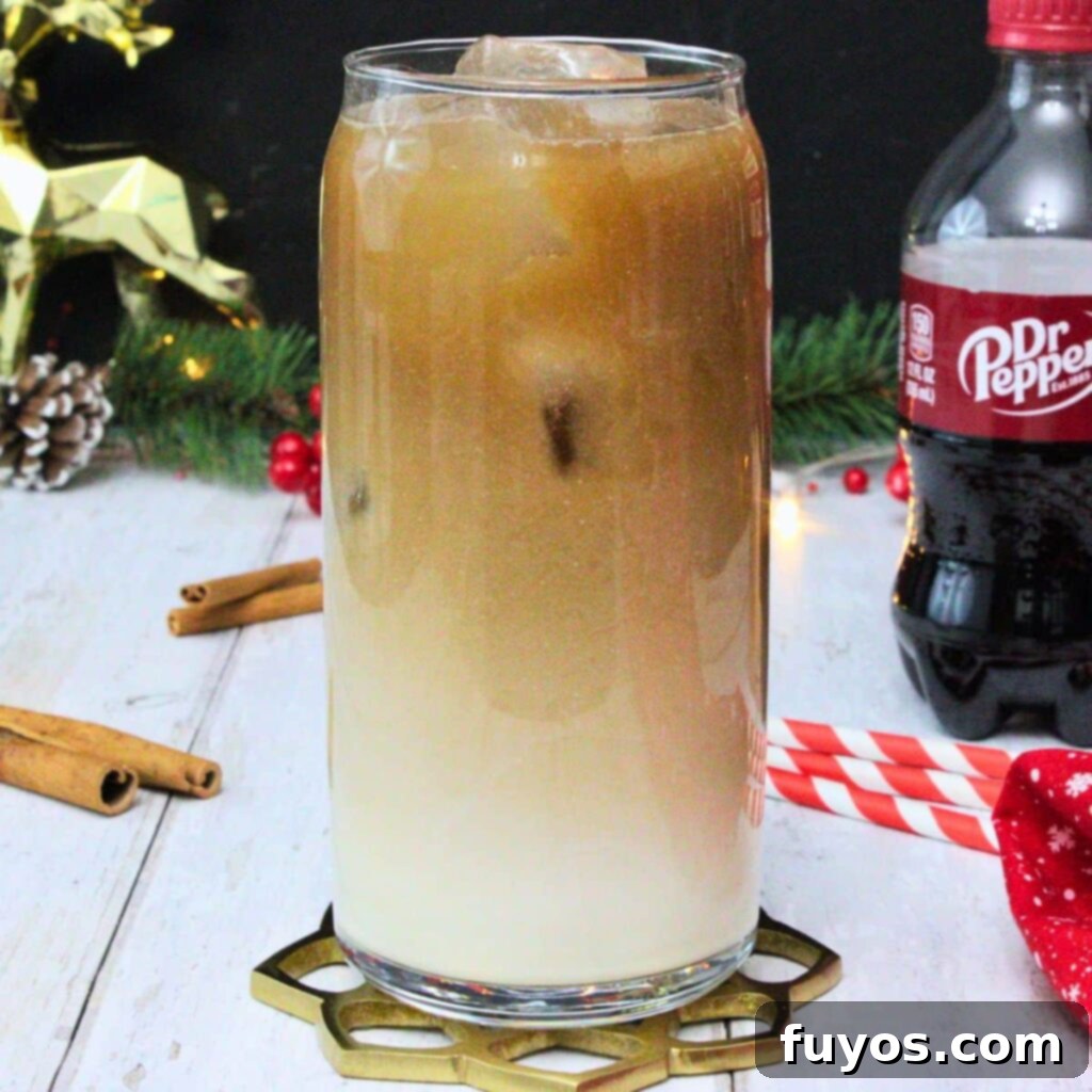 Dr Pepper Eggnog Rum Punch: A Festive Holiday Mixer 2 Dr Pepper eggnog recipe served in a tall glass