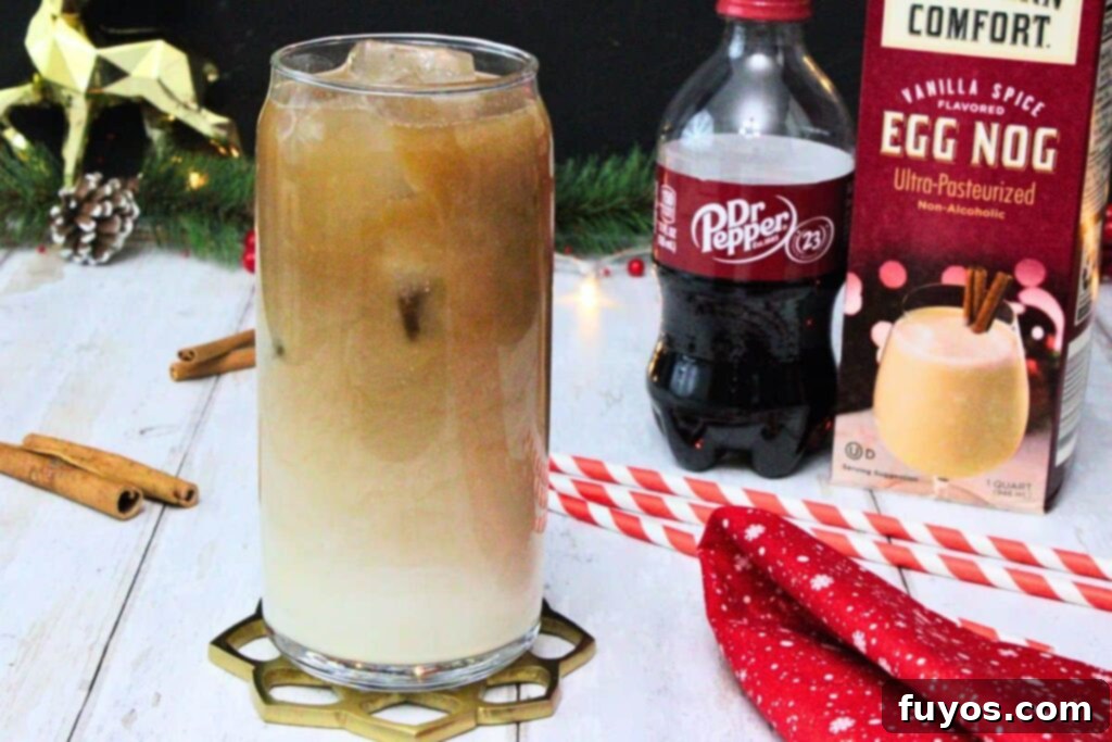 Dr Pepper Eggnog Rum Punch: A Festive Holiday Mixer 8 Dr Pepper eggnog drink next to a soda and rum bottle