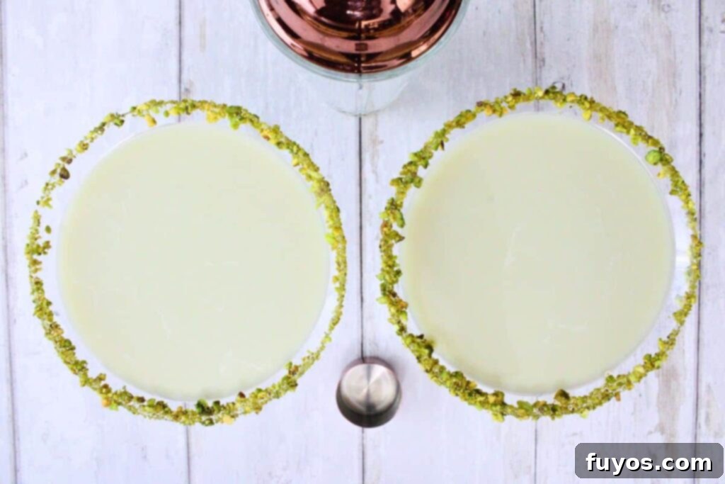shake and strain chilled pistachio martini into glass