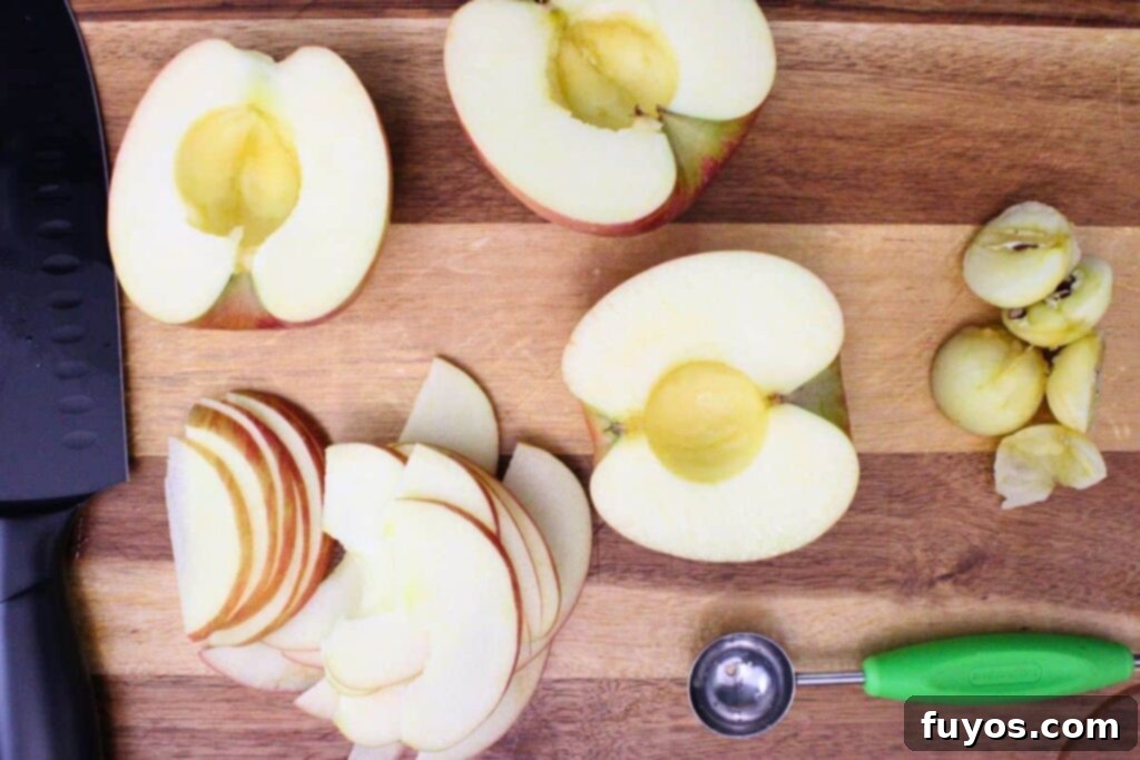 Cut apples in half and remove the core, ready for slicing
