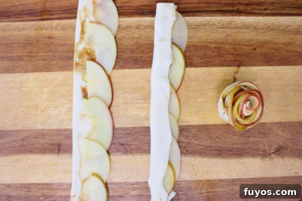 Fold dough over bottom apple edge and roll into a rose shape