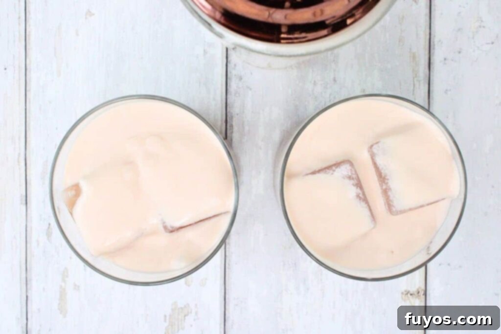 Shake and strain chilled Pink Russian into glasses