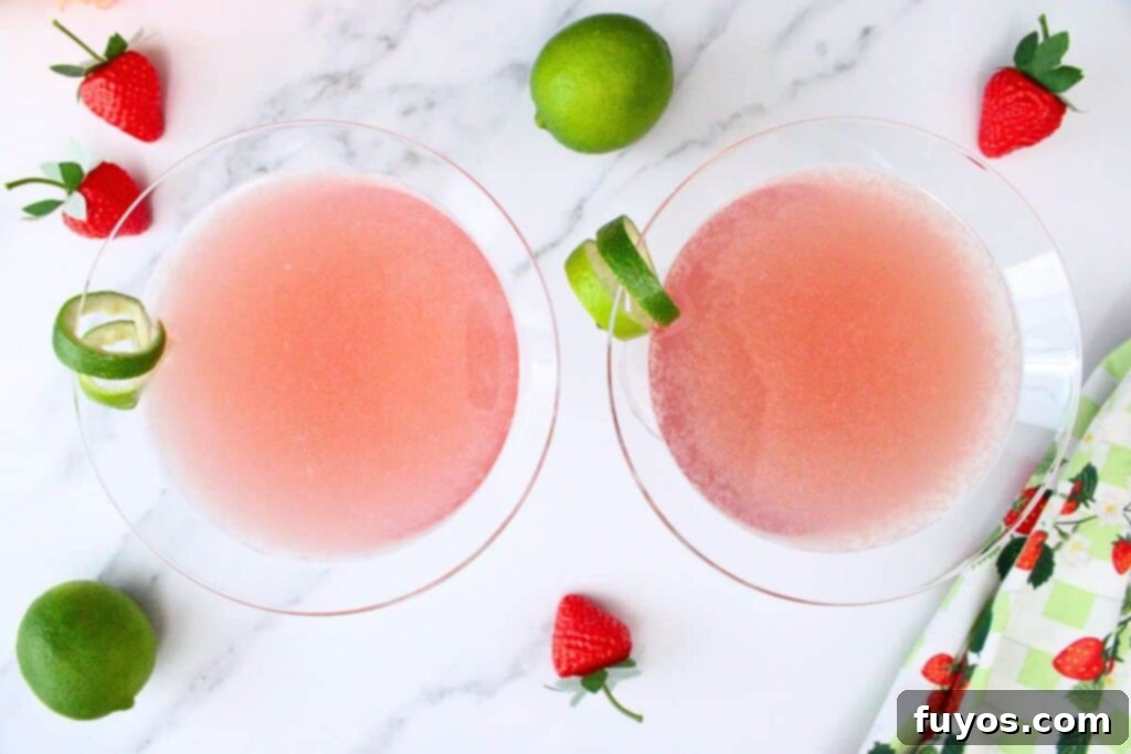 Pink Whitney Cosmo: A Refreshing Spin on the Classic Cosmopolitan 7 Finished Pink Whitney Cosmos with lime garnish