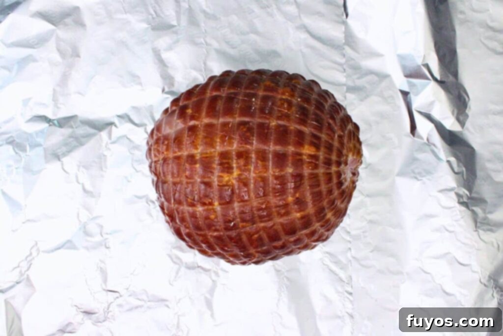 Use a sharp knife to score ham if not precut