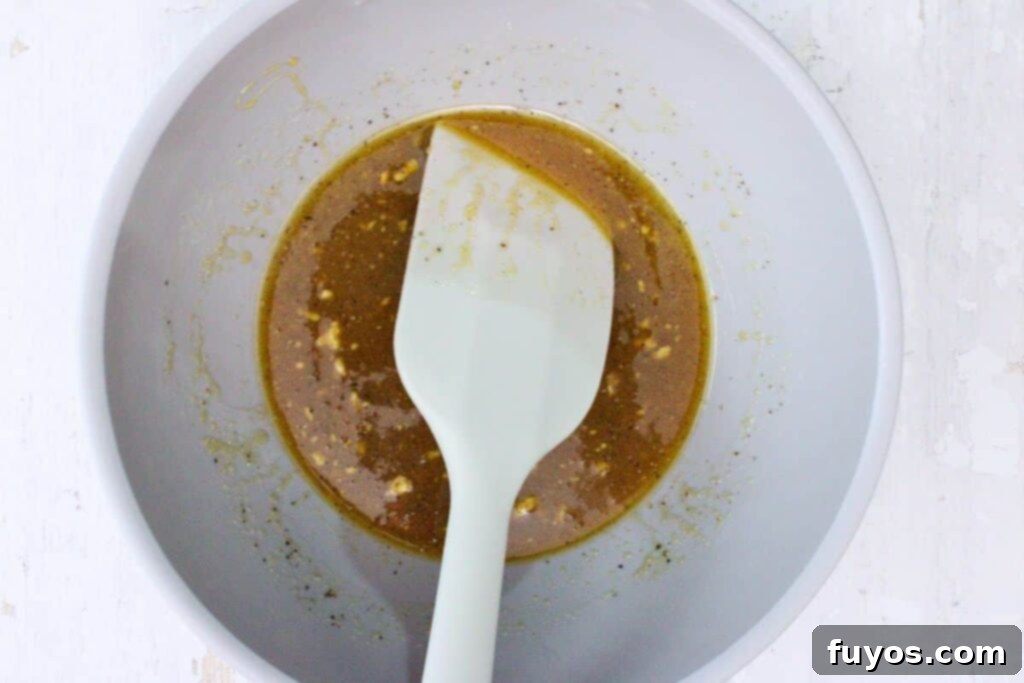 Mix small ham glaze ingredients in a bowl