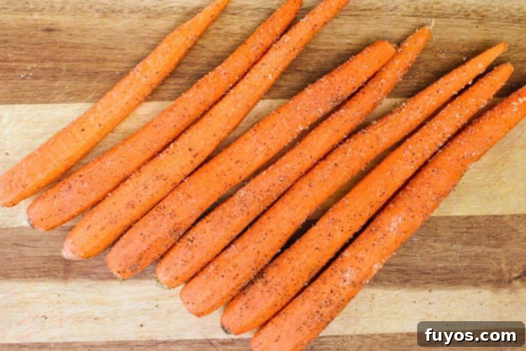 Air Fryer Bacon-Wrapped Carrots Drizzled with Hot Honey 5 Toss peeled carrots with salt, pepper, and garlic powder