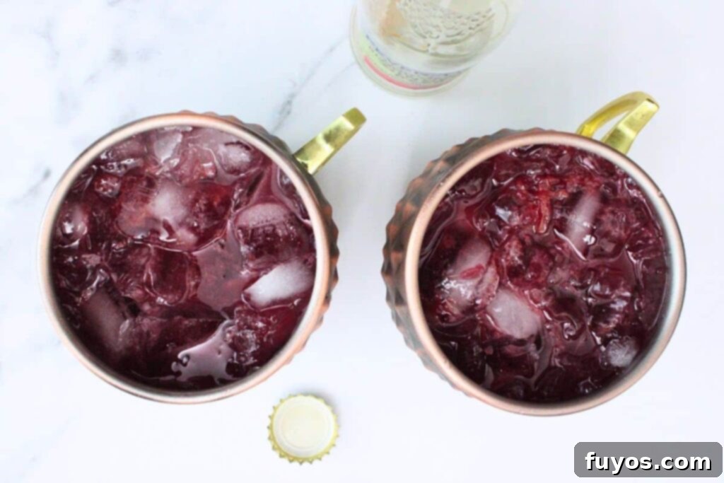 Blood Orange Bliss: A Zesty Vodka Ginger Beer Cocktail 7 Top with Ginger Beer