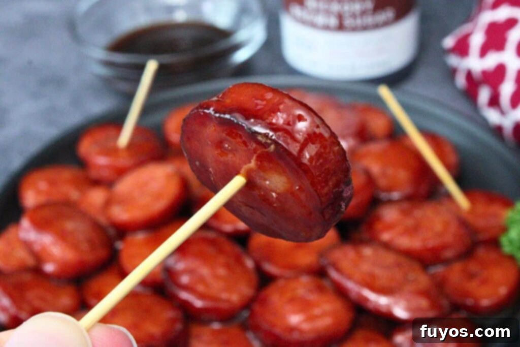 Air Fryer Kielbasa Bites: Sweet & Smoky Sensation 3 Glazed kielbasa bite on a toothpick