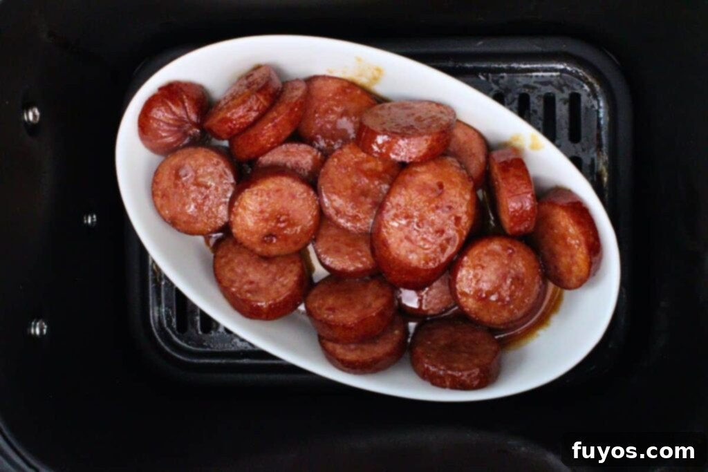 Air Fryer Kielbasa Bites: Sweet & Smoky Sensation 8 Caramelizing glazed kielbasa